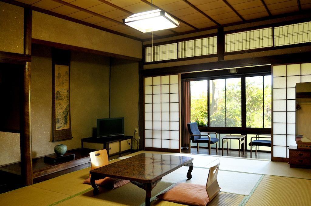 Hitoyoshi Ryokan Quarto foto